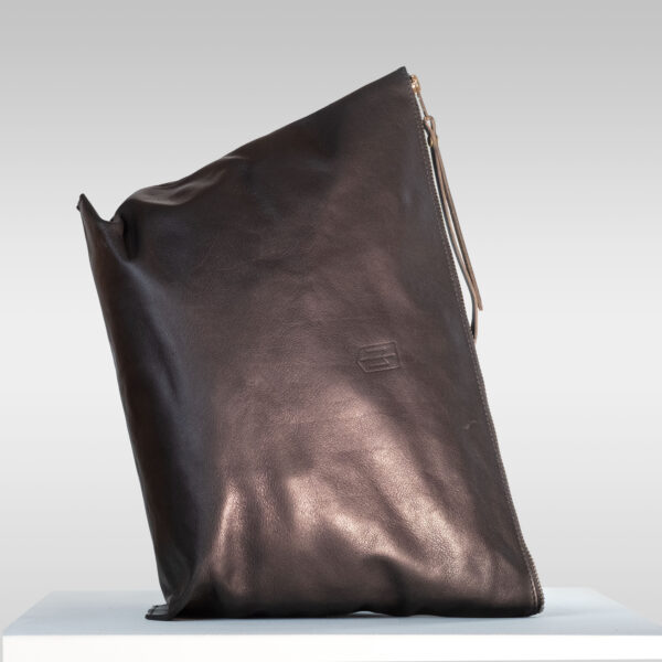 The the wend pouch in large by Monolar laying on the side