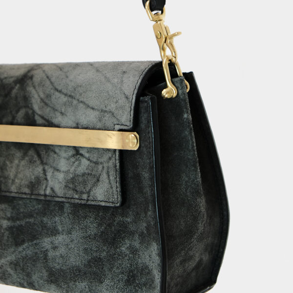 Pure brass Hardware and seams of the small subtilis bag by Monolar
